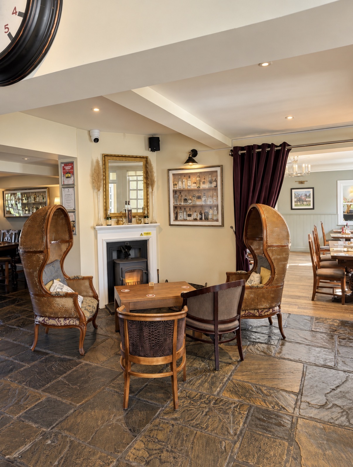 Fireside seating inside The Swan at Compton